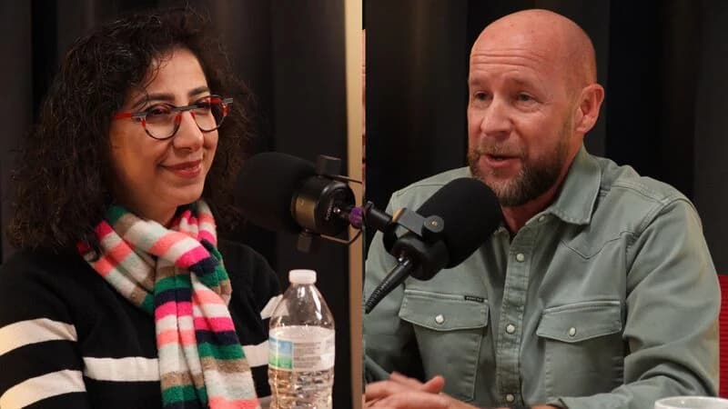Two hosts talking across the Eleva Studio table, mics on boom arms